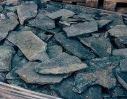 Aprende c&oacute;mo pegar piedra laja y decora tus paredes con estas ideas